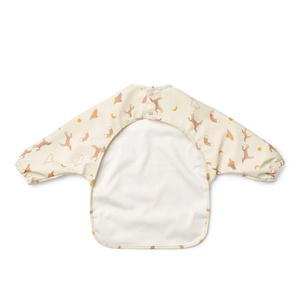 Babero manga larga MERLE Liewood Dream ecru