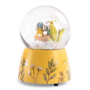 Bola de nieve musical TROIS PETITS LAPINS Moulin Roty