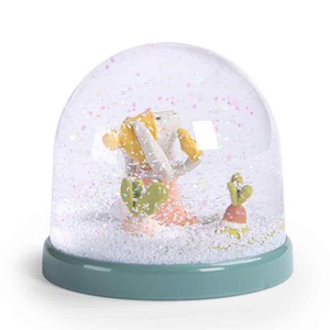 Bola de nieve TROIS PETITS LAPINS Moulin Roty