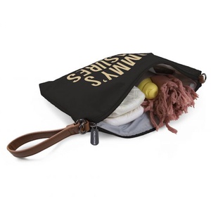 Bolso de mano MOMMY CLUTCH Childhome negro-dorado