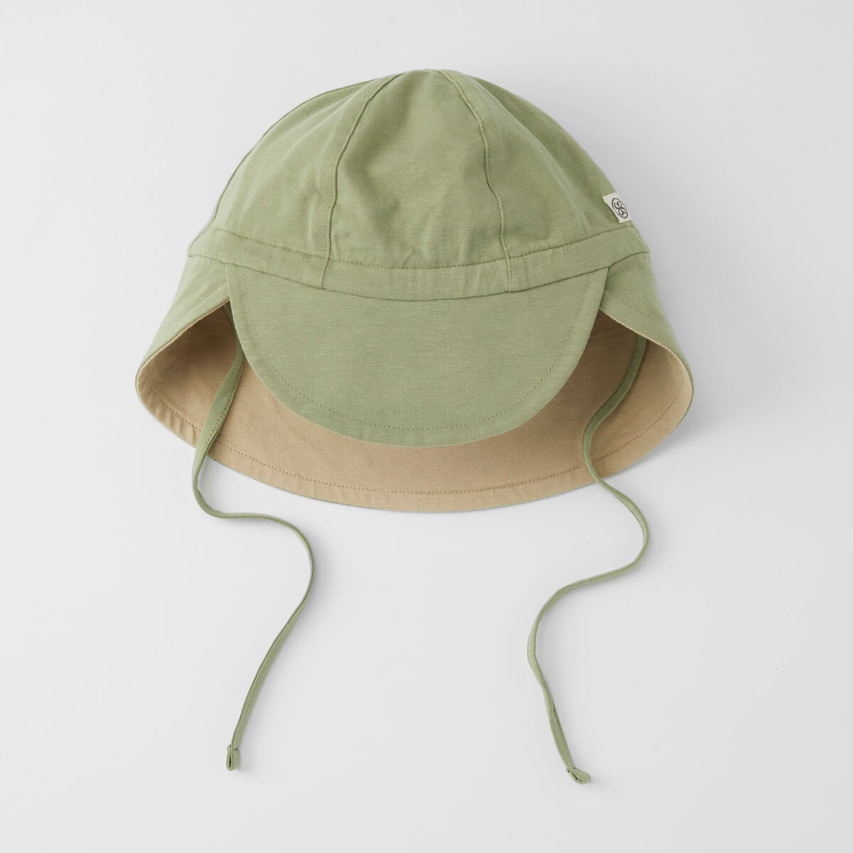 Gorra reversible UV 6-12m Cloby olive green-sandy beach