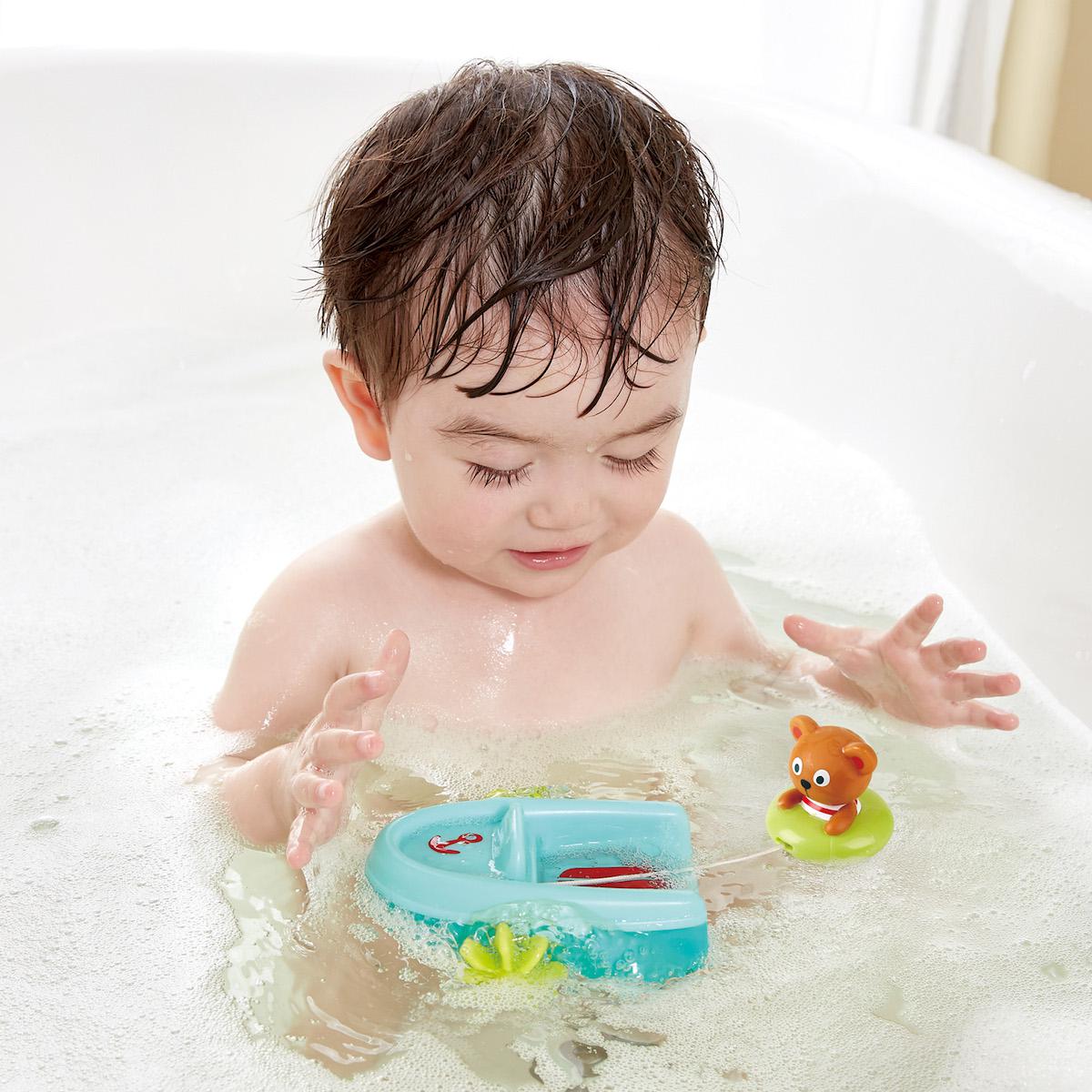 Juguete baño TUBING PULL-BACK BOAT  Hape