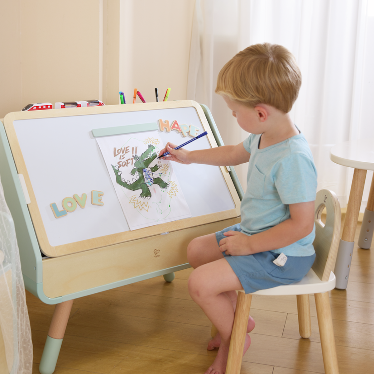 Mesa dibujo y biblioteca 2 en 1 Hape
