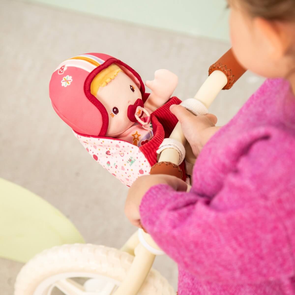 Muñeca-asiento bicicleta LENA Lilliputiens