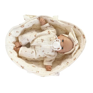 Muñeca Nina 26cm BOBBLE flores rosa