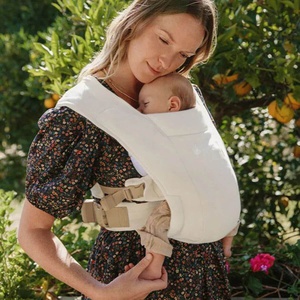 Portabebé EMBRACE Ergobaby Soft Knit crema