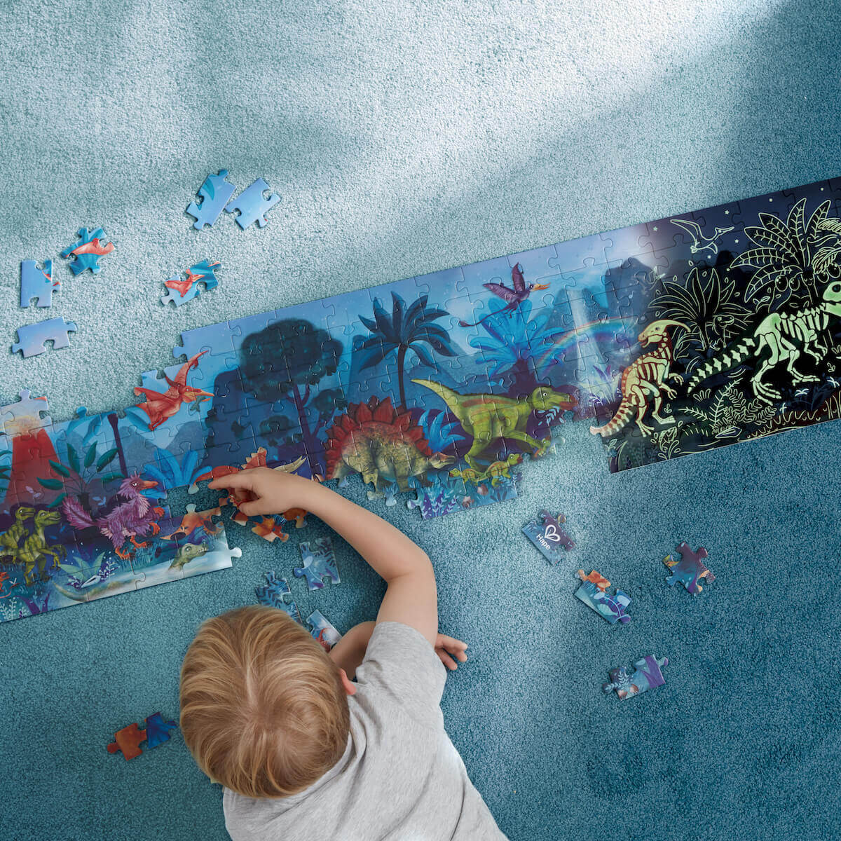 Puzzle fluorescente 200pzas DINOSAURS Hape