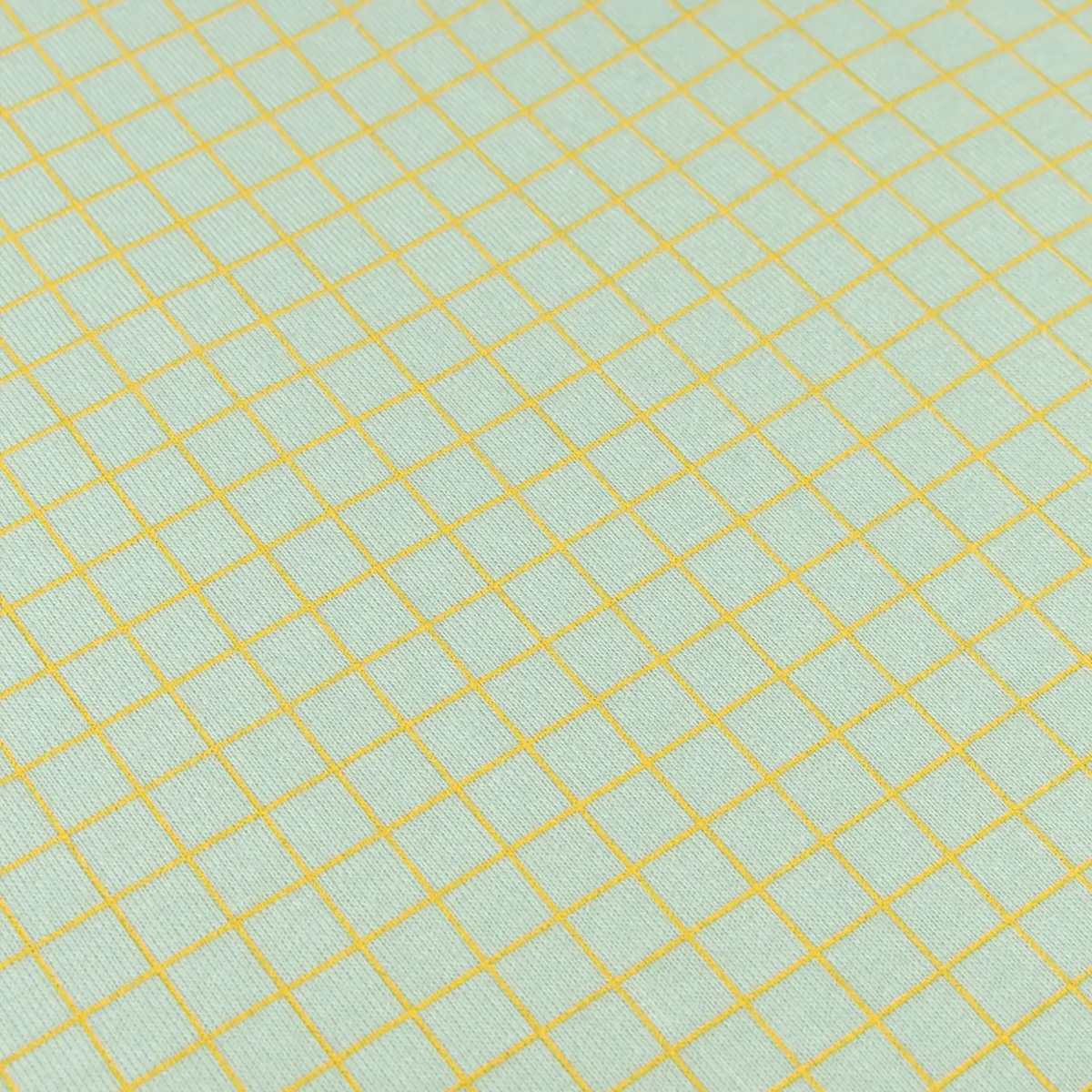 Sábana ajustable 70x140cm STORIES Edición Limitada Nobodinoz green lemon grid