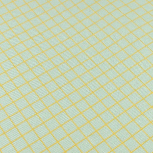 Sábana ajustable 70x140cm STORIES Edición Limitada Nobodinoz green lemon grid